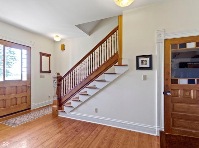 19702 Centennial Rd, Sheridan, IN 46069 - entryway with stairs and wood finished floors
