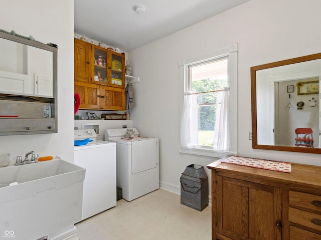19702 Centennial Rd, Sheridan, IN 46069 - washroom with cabinet space, washer and dryer, and light flooring