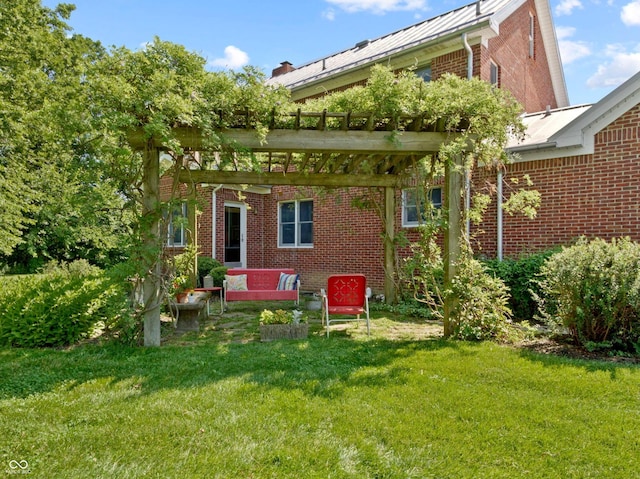 19702 Centennial Rd, Sheridan, IN 46069 - rear view of property with brick siding, a lawn, a pergola, and outdoor lounge area