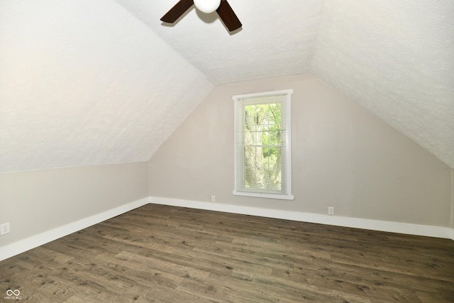 631 Prospect St, Indianapolis, IN 46203 - bonus room with lofted ceiling, ceiling fan, wood finished floors, and a textured ceiling