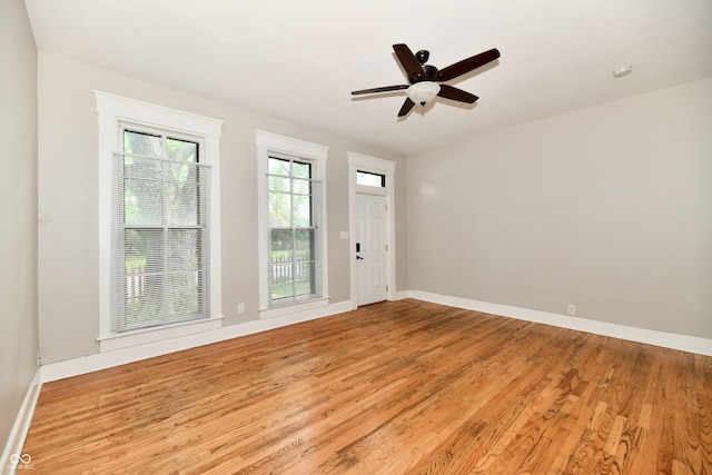 631 Prospect St, Indianapolis, IN 46203 - unfurnished room with light wood-type flooring, ceiling fan, and a smoke detector