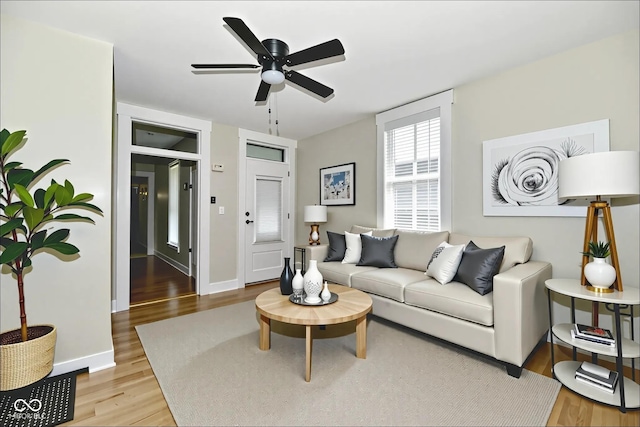 631 Prospect St, Indianapolis, IN 46203 - living room with wood finished floors and ceiling fan