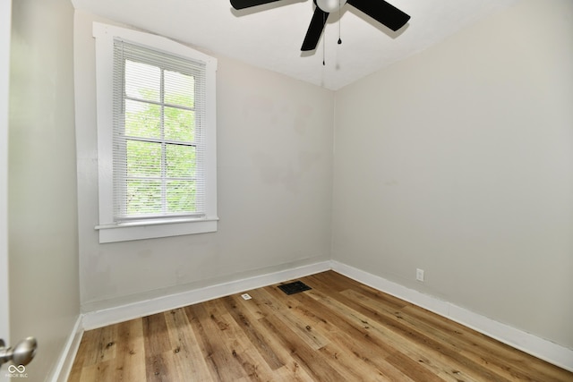 631 Prospect St, Indianapolis, IN 46203 - unfurnished room with light wood-style floors and ceiling fan