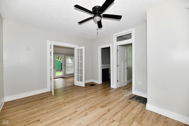 631 Prospect St, Indianapolis, IN 46203 - spare room with light wood-type flooring and ceiling fan