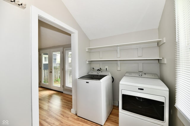 631 Prospect St, Indianapolis, IN 46203 - laundry room with separate washer and dryer, french doors, and light wood-style floors