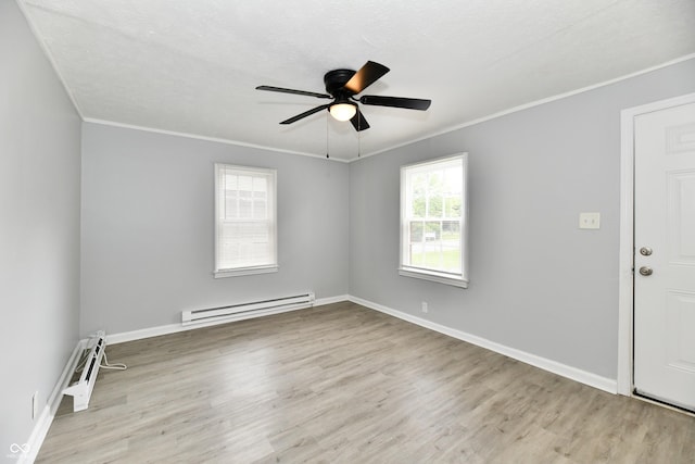 2966 N Olney St, Indianapolis, IN 46218 - spare room with a baseboard radiator, wood finished floors, ceiling fan, ornamental molding, and baseboards
