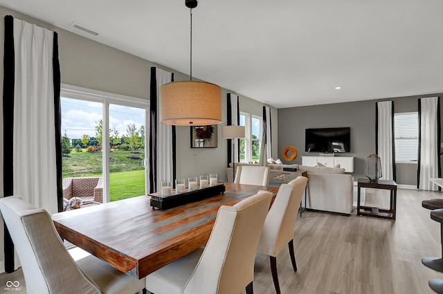 dining room featuring light wood-style flooring