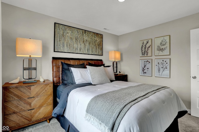 bedroom featuring carpet floors and baseboards