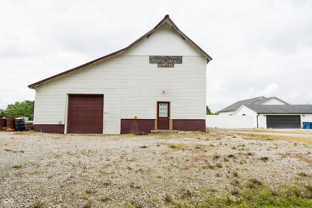 view of property exterior featuring a garage