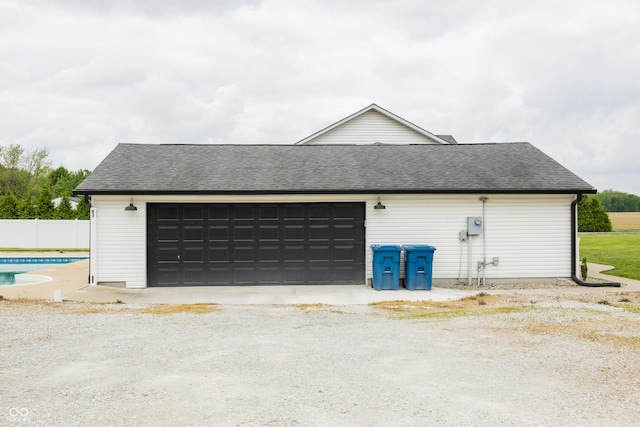 garage featuring fence