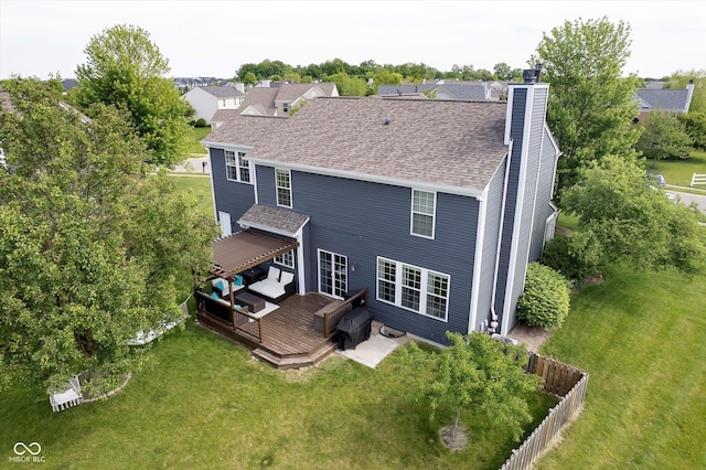 14130 Autumn Woods Dr, Carmel, IN 46074 - back of property with a wooden deck, a chimney, roof with shingles, and an outdoor living space