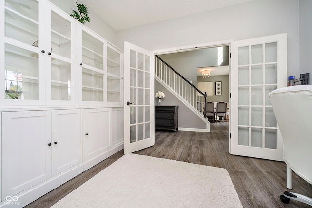 14130 Autumn Woods Dr, Carmel, IN 46074 - unfurnished office with french doors, dark wood-style flooring, and baseboards