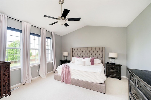 14130 Autumn Woods Dr, Carmel, IN 46074 - carpeted bedroom featuring multiple windows, vaulted ceiling, baseboards, and a ceiling fan
