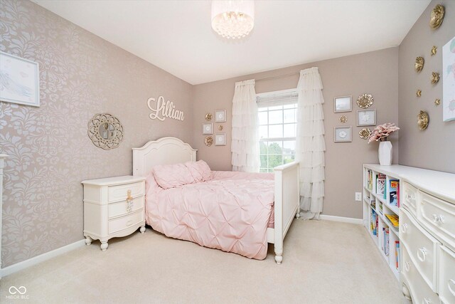 14130 Autumn Woods Dr, Carmel, IN 46074 - bedroom featuring light colored carpet, wallpapered walls, baseboards, and a chandelier
