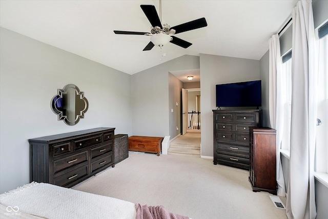 14130 Autumn Woods Dr, Carmel, IN 46074 - bedroom with lofted ceiling, light carpet, baseboards, and ceiling fan