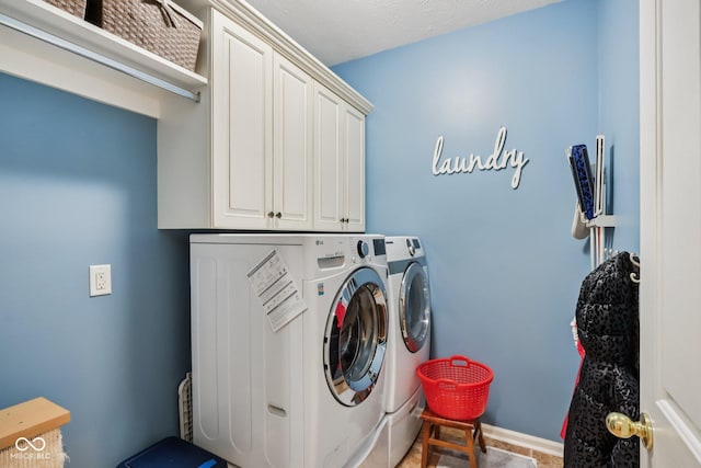 9311 Windrift Way, Zionsville, IN 46077 - laundry area featuring washing machine and clothes dryer and cabinet space