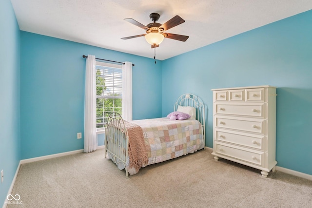 9311 Windrift Way, Zionsville, IN 46077 - carpeted bedroom with baseboards and a ceiling fan
