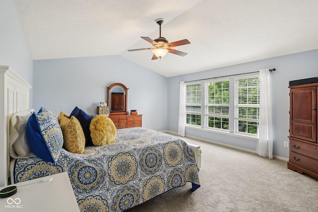 9311 Windrift Way, Zionsville, IN 46077 - bedroom with lofted ceiling, carpet floors, and a ceiling fan
