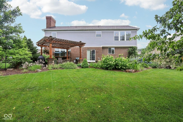 9311 Windrift Way, Zionsville, IN 46077 - back of property with a pergola, a chimney, a lawn, and brick siding