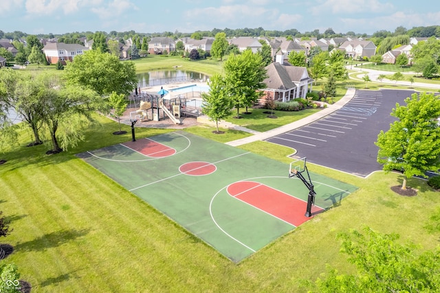 9311 Windrift Way, Zionsville, IN 46077 - view of basketball court with a residential view, community basketball court, and a yard