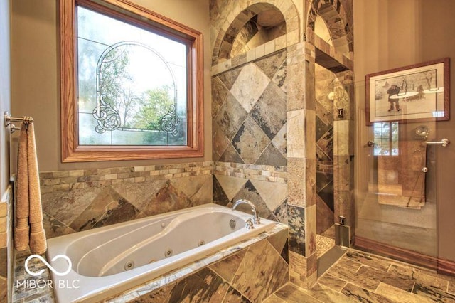 125 Ems B20C Ln, Pierceton, IN 46562 - full bathroom featuring a shower stall and a jetted tub