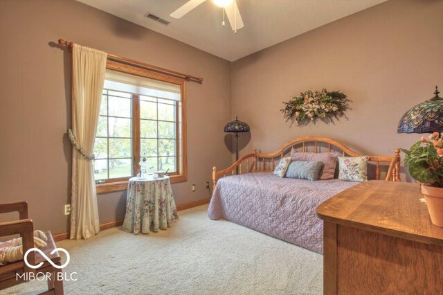 125 Ems B20C Ln, Pierceton, IN 46562 - bedroom featuring carpet floors, baseboards, and a ceiling fan