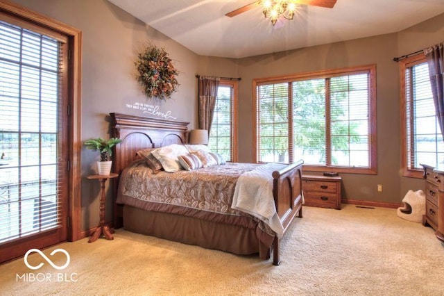 125 Ems B20C Ln, Pierceton, IN 46562 - carpeted bedroom featuring multiple windows, baseboards, and a ceiling fan