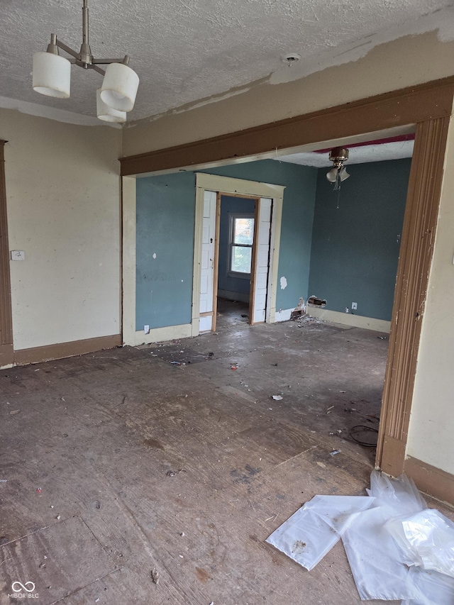 1331 S 14th St, New Castle, IN 47362 - unfurnished room with a textured ceiling and baseboards