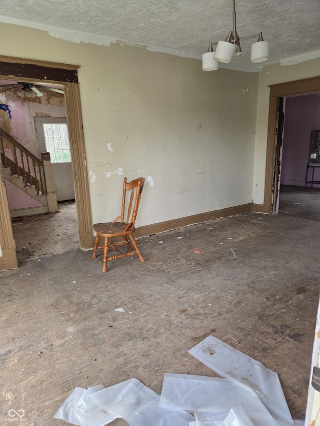1331 S 14th St, New Castle, IN 47362 - unfurnished room featuring stairway and a textured ceiling