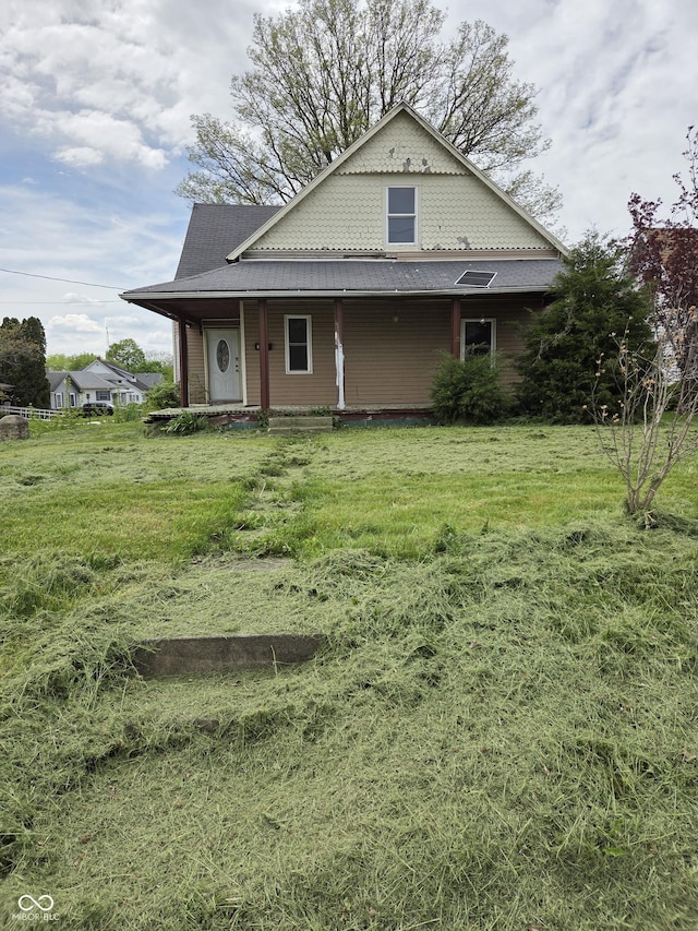 1331 S 14th St, New Castle, IN 47362 - view of front of home with a front yard and a porch