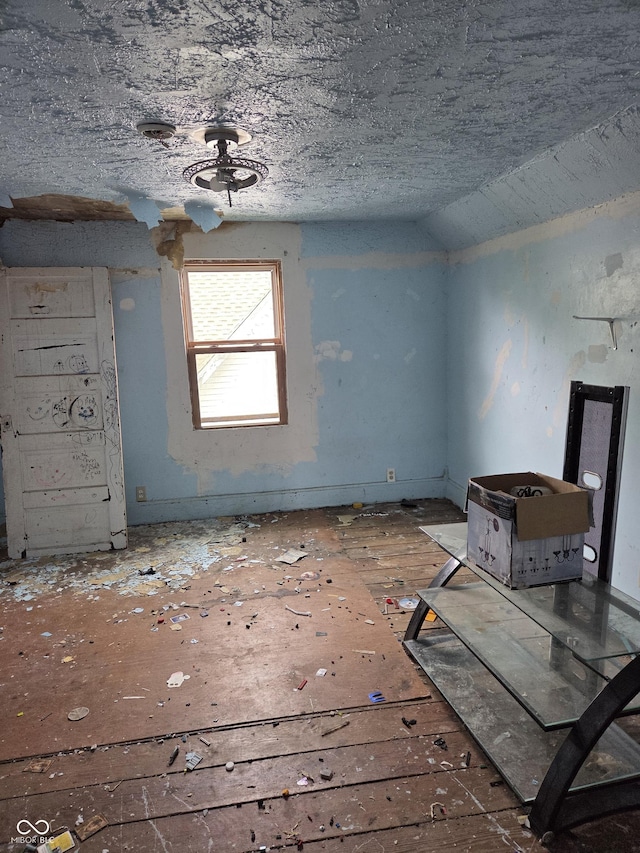 1331 S 14th St, New Castle, IN 47362 - unfurnished living room with ceiling fan and lofted ceiling