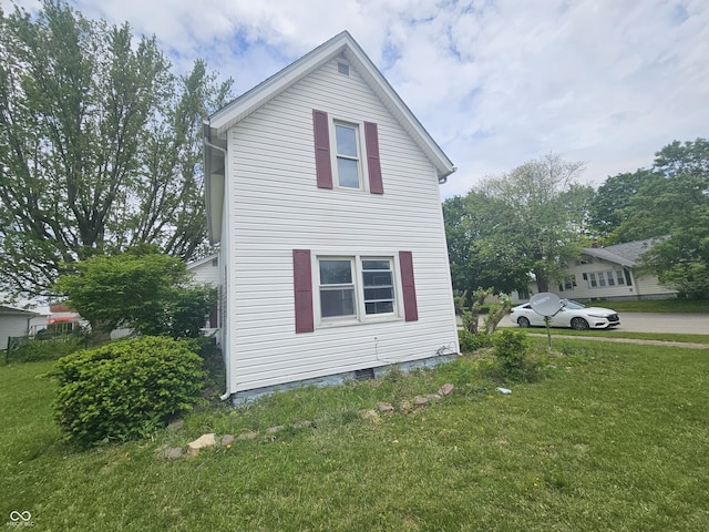 208 S Madison St, Converse, IN 46919 - view of side of home featuring a yard