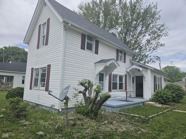 208 S Madison St, Converse, IN 46919 - back of house featuring a shingled roof
