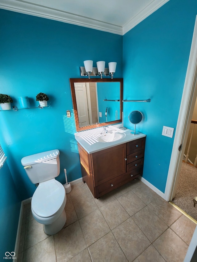 5433 Brendonridge Rd, Indianapolis, IN 46226 - bathroom featuring tile patterned floors, baseboards, crown molding, toilet, and vanity