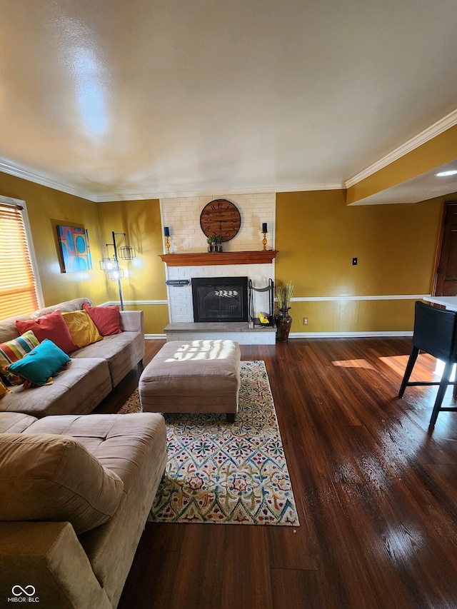 5433 Brendonridge Rd, Indianapolis, IN 46226 - living room with hardwood / wood-style flooring, crown molding, a brick fireplace, a wainscoted wall, and baseboards