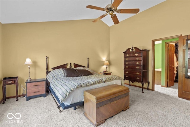 14814 Beacon Blvd, Carmel, IN 46032 - bedroom with light carpet, vaulted ceiling, a ceiling fan, and baseboards
