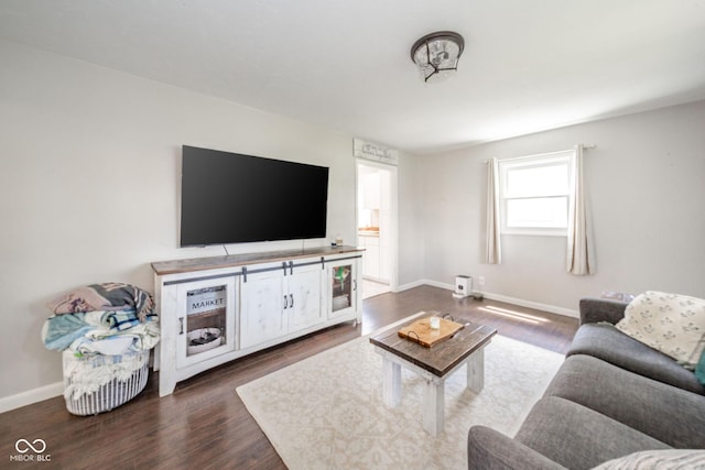 433 N 15th Ave, Beech Grove, IN 46107 - living area featuring dark wood-style flooring and baseboards