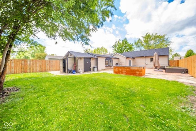 433 N 15th Ave, Beech Grove, IN 46107 - rear view of house featuring a hot tub and a patio area