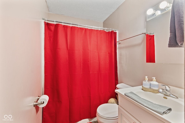 5115 Bertha St, Indianapolis, IN 46241 - full bath with toilet, vanity, a shower with curtain, and a textured ceiling