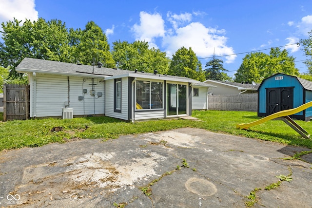 5115 Bertha St, Indianapolis, IN 46241 - rear view of property with a patio area and central AC