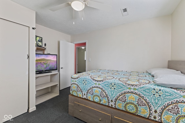 5115 Bertha St, Indianapolis, IN 46241 - bedroom with dark carpet and ceiling fan