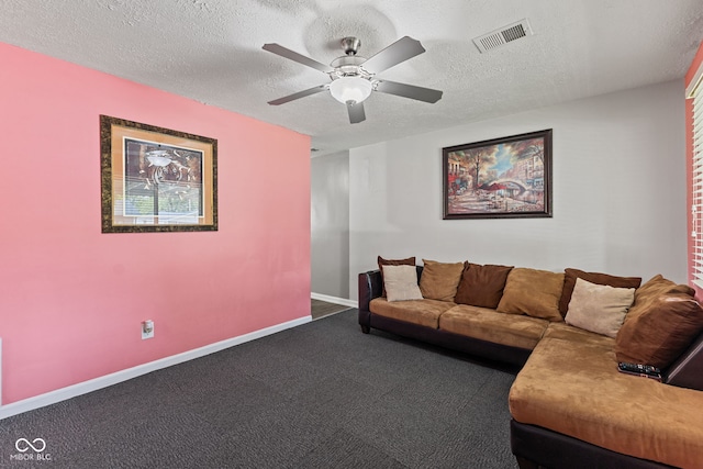 5115 Bertha St, Indianapolis, IN 46241 - carpeted living room with a textured ceiling, ceiling fan, and baseboards