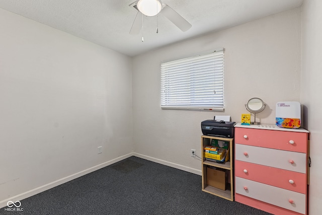 5115 Bertha St, Indianapolis, IN 46241 - recreation room with carpet floors, ceiling fan, and baseboards