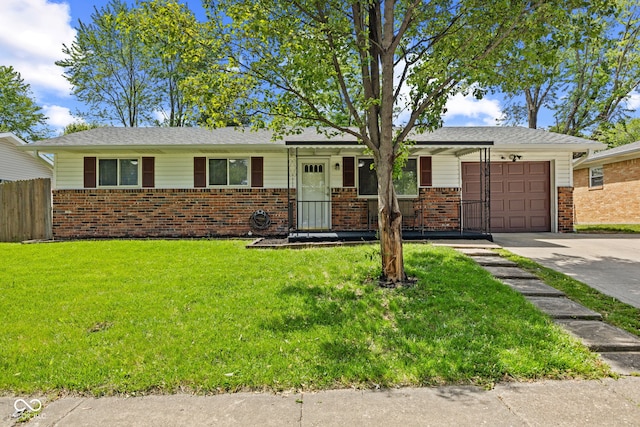 5115 Bertha St, Indianapolis, IN 46241 - single story home featuring brick siding, a garage, and concrete driveway