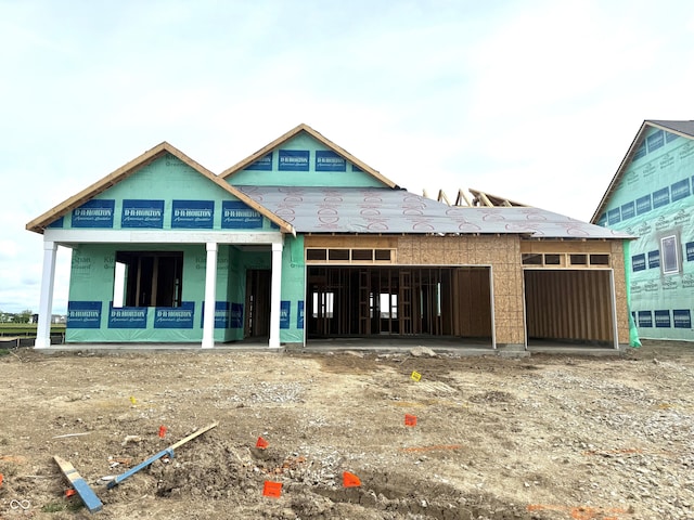property under construction featuring a garage