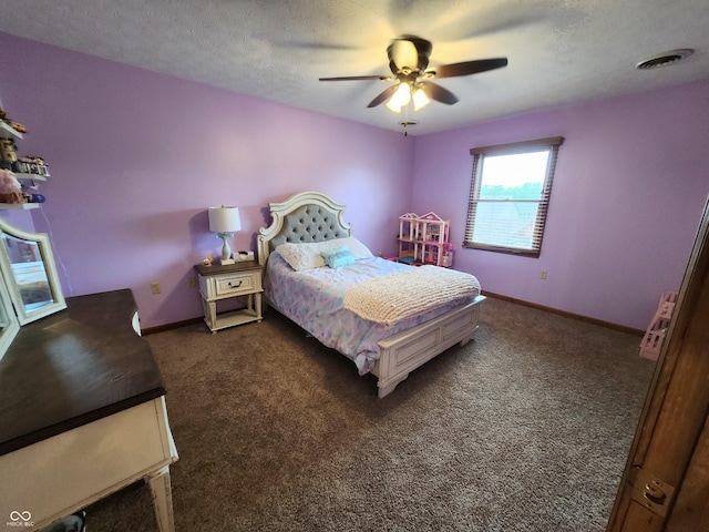 1026 Summer Way Dr, Shelbyville, IN 46176 - bedroom featuring dark carpet, baseboards, a ceiling fan, and a textured ceiling