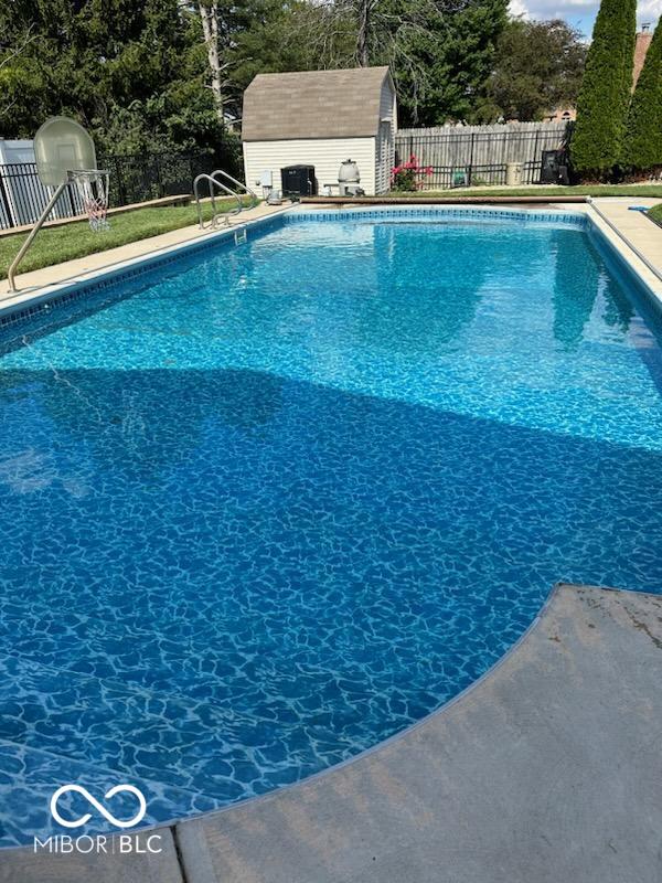 1026 Summer Way Dr, Shelbyville, IN 46176 - view of pool with view of wooded area