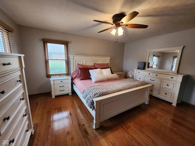 1026 Summer Way Dr, Shelbyville, IN 46176 - bedroom featuring dark wood-style flooring, multiple windows, and baseboards