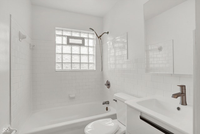 full bathroom with tile walls, toilet, shower / bathtub combination, and vanity