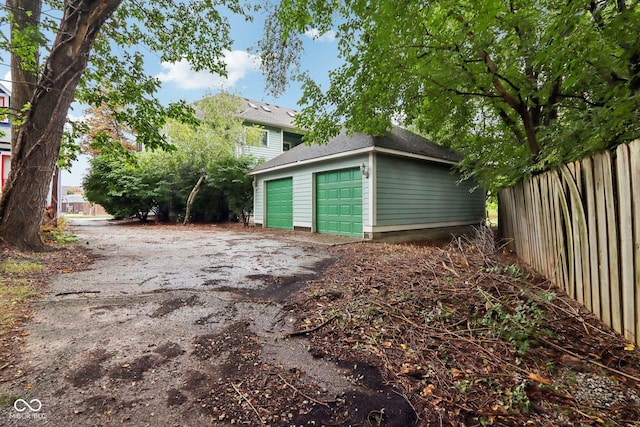 455 S Pine St Unit 4, Indianapolis, IN 46203 - detached garage featuring fence